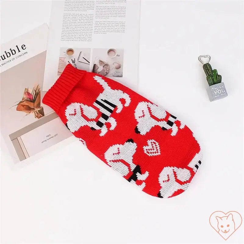 Cute red cat sweater costume with cartoon design, perfect for winter warmth and style for cats.