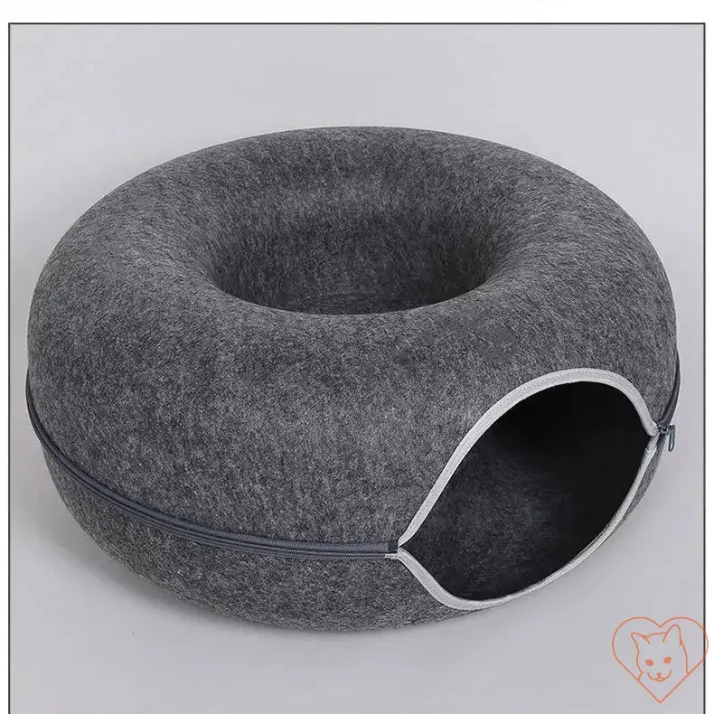 Donut cat bed with interactive tunnel, made from premium wool felt for cozy comfort and playful hiding.