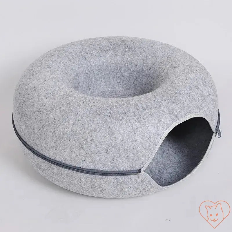 Donut cat bed made of grey wool felt with interactive tunnel for hiding and playing for cats.