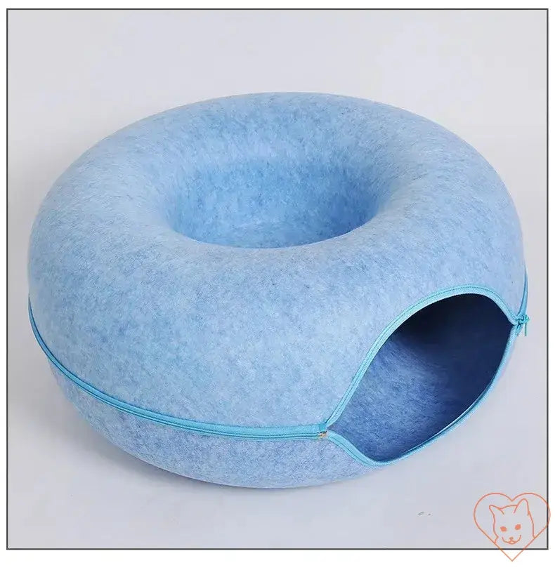 Blue donut cat bed with interactive tunnel made from premium wool felt for comfort and play.