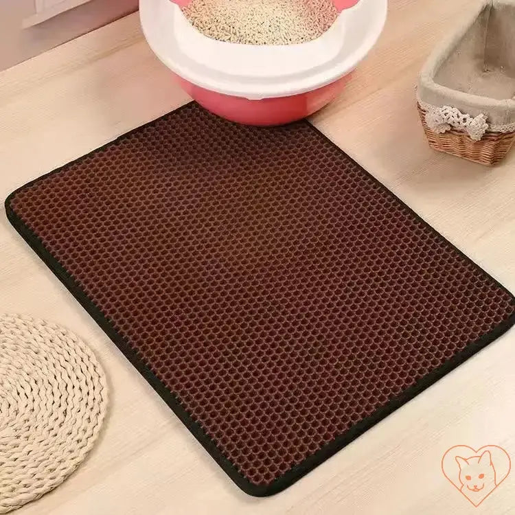 Double-layer waterproof cat litter mat with non-slip surface to catch litter granules and keep floors clean.