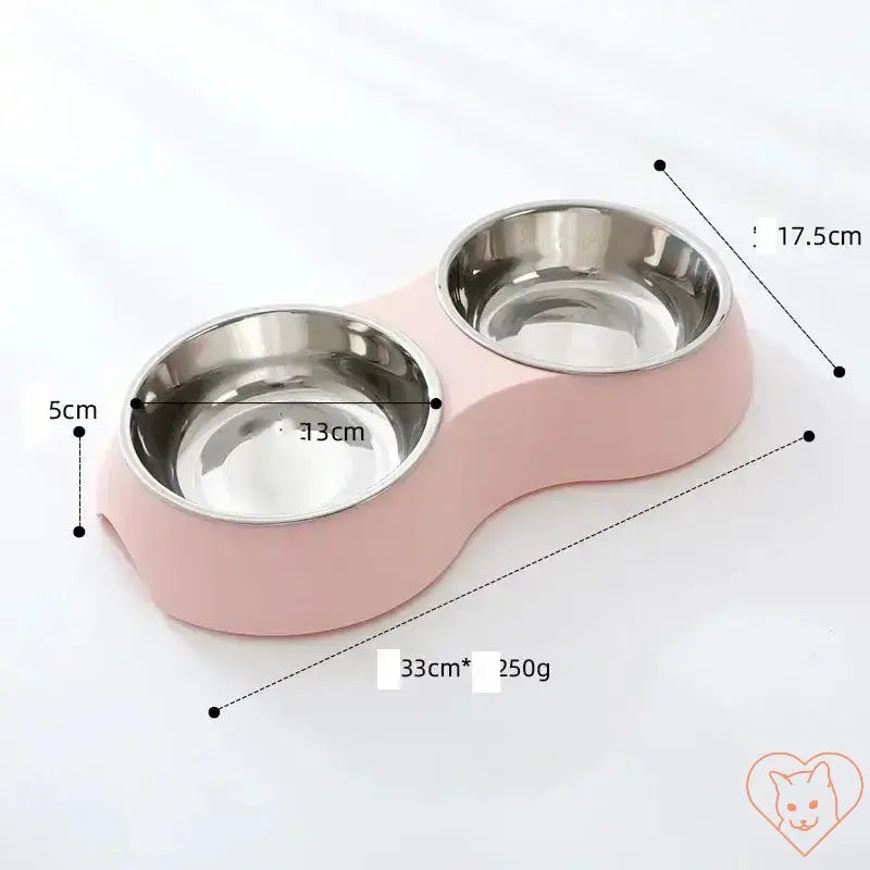 Double stainless steel pet food bowl in pink base, ideal for dogs and cats, with dimensions marked for easy reference.