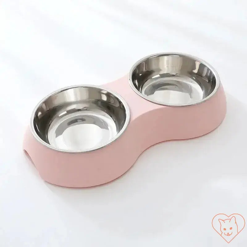 Double Stainless Steel Pet Food Bowl in pink base, ideal for feeding dogs and cats food and water simultaneously.