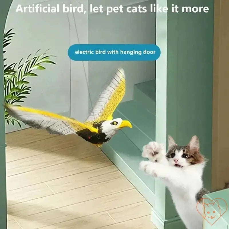 Electric hanging bird toy with a cat reaching for it, showcasing interactive play for pets.