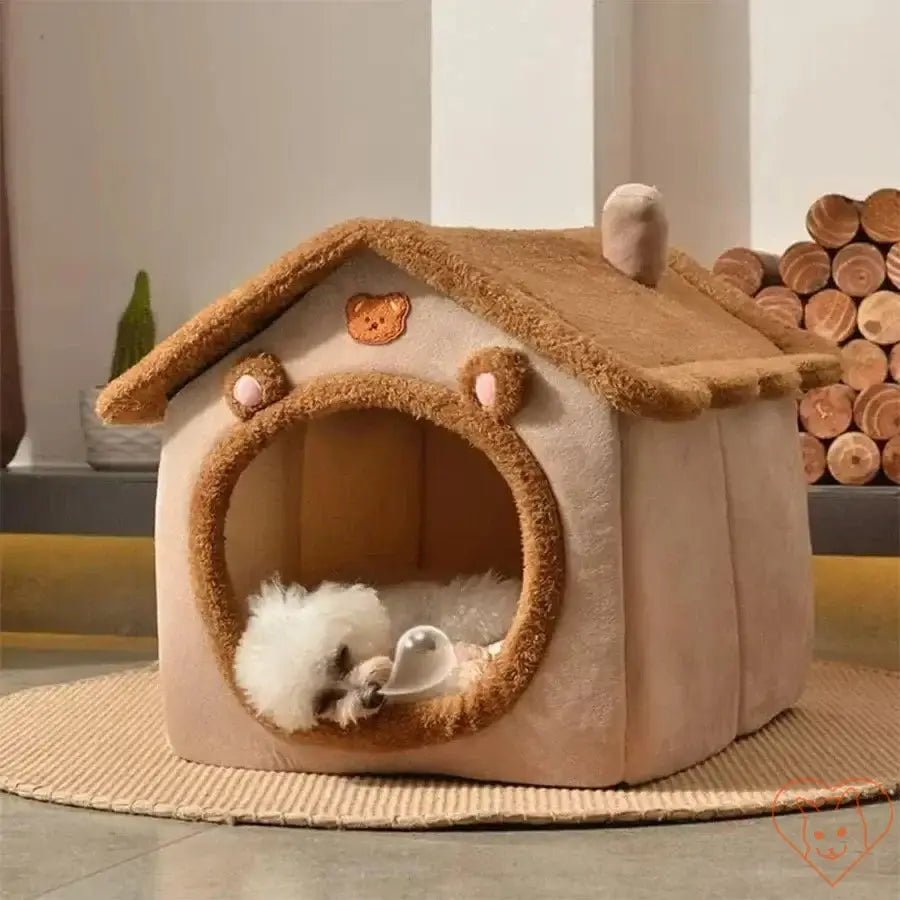 Cozy foldable cat bed shaped like a house, featuring soft fabric and a fluffy pet inside for a comfy retreat.