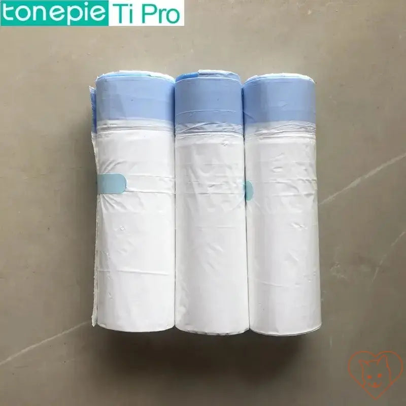 Three rolls of heavy duty cat litter box liners designed for TONEPIE automatic litter boxes on a flat surface.