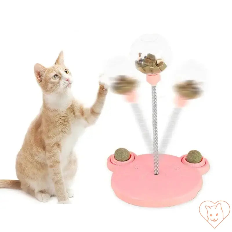 Interactive cat toy with swinging food ball, encouraging play and treat-seeking behavior for pets.