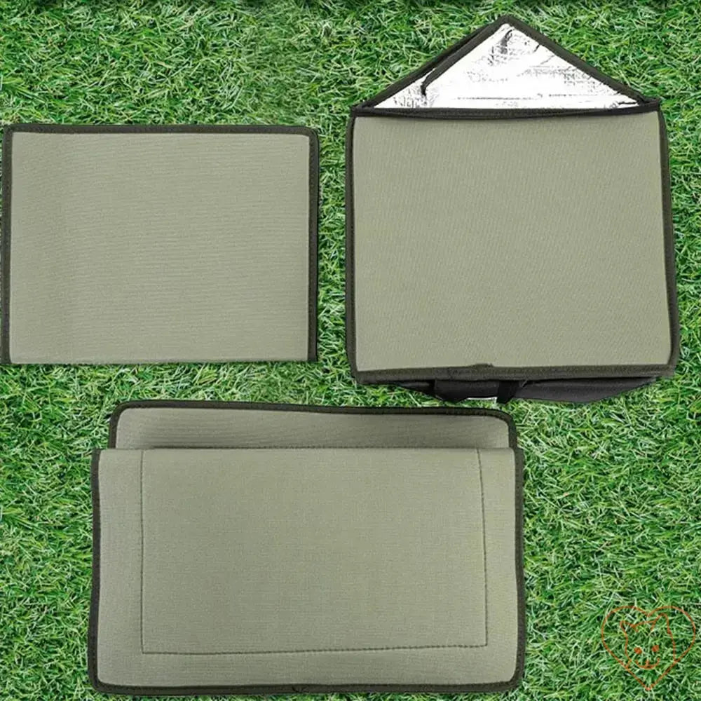 Large insulated cat outdoor shelter parts displayed on grass, showcasing waterproof and weatherproof design.