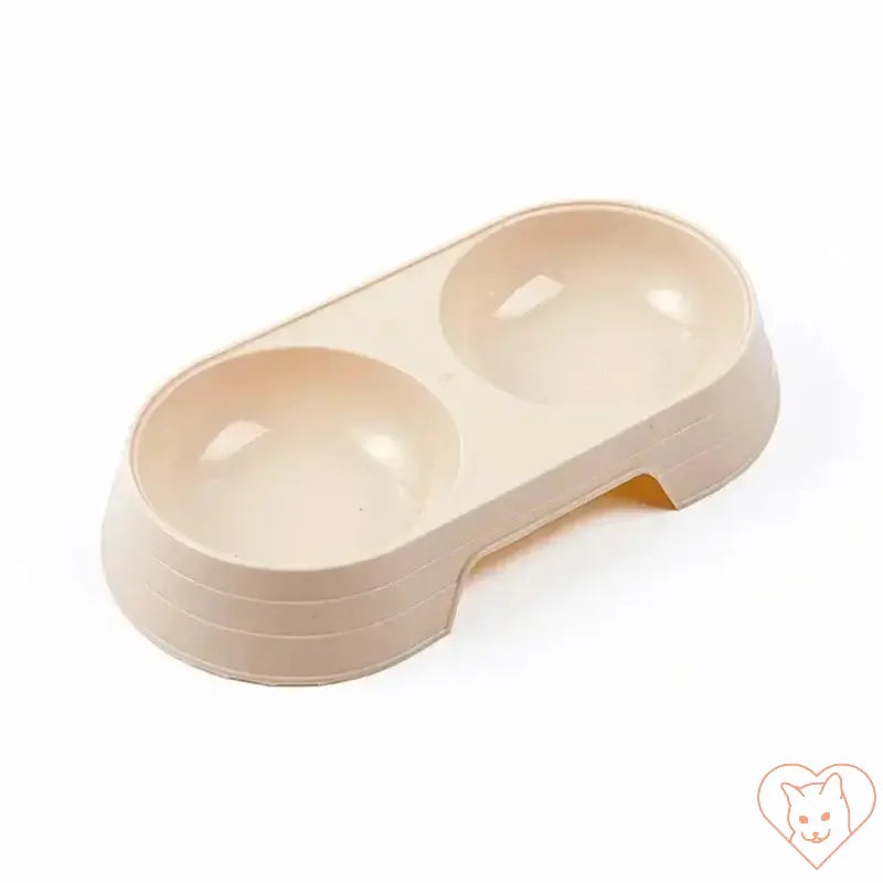 Macaron double bowl for dogs and cats, compact design for food and water, lightweight and durable feeding solution.