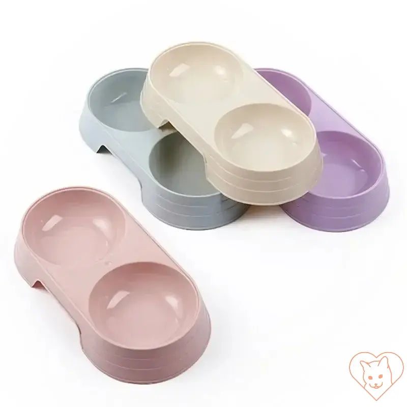 Macaron Double Bowl for dogs and cats, featuring two compartments in pastel colors for food and water.