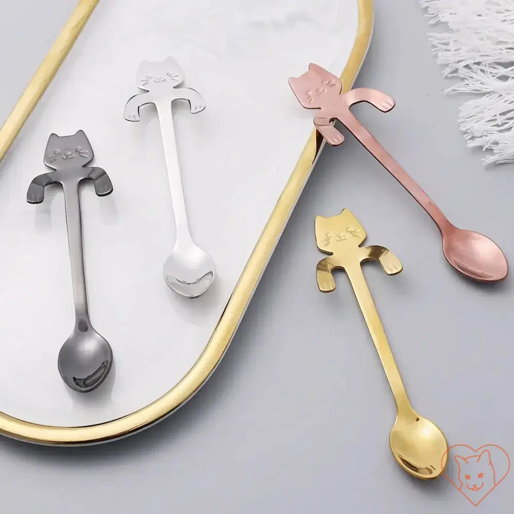 Mini Cat Coffee Spoons in silver, rose gold, and gold on a tray, perfect for desserts and snacks.