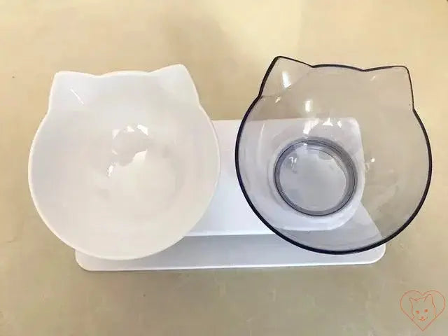 Non-slip double cat bowl set with stand, featuring a 15° tilt for comfortable feeding.