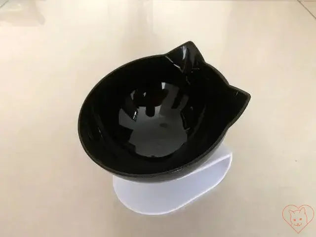 Non-slip black cat bowl with stand, featuring a 15° tilt design for ergonomic feeding.