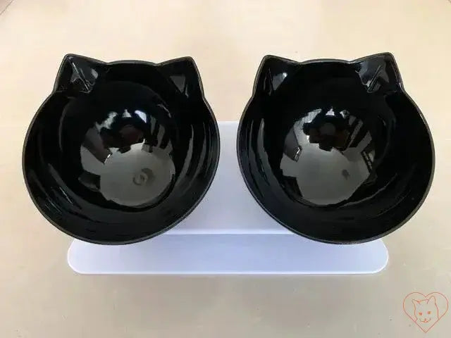 Non-slip double cat bowls with stand, featuring cute cat ears and a 15° tilt design for comfortable feeding.