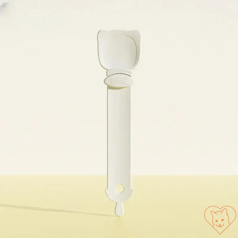 Multifunctional pet feeder spoon for cats and puppies, designed for dispensing wet food and treats.