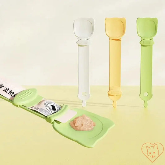 Multifunctional pet feeder spoons in green, yellow, and white, designed for dispensing wet cat food and snacks.