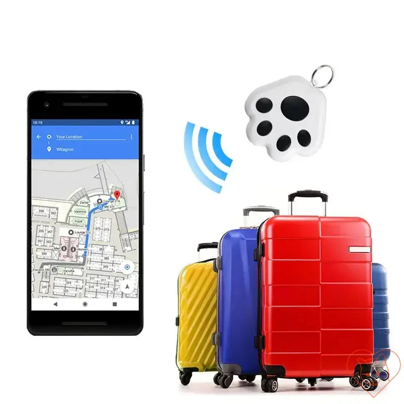 Smartphone displaying map with Bluetooth pet tracker near colorful suitcases for location tracking.