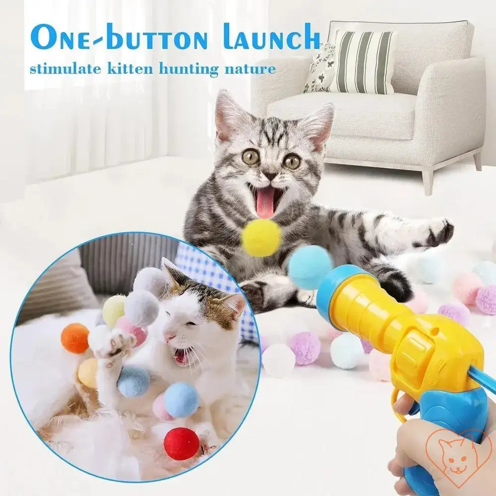 Interactive cat toy with plush balls; one-button launch stimulating hunting play for kittens.