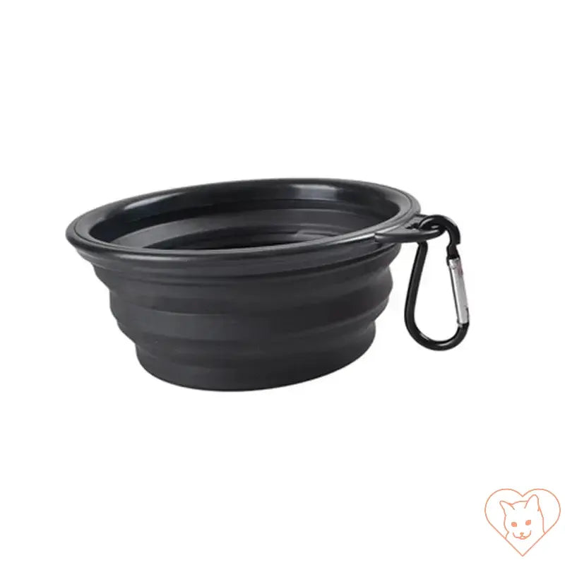 Portable folding silicone pet bowl with carabiner for dogs and cats, lightweight and easy to clean.