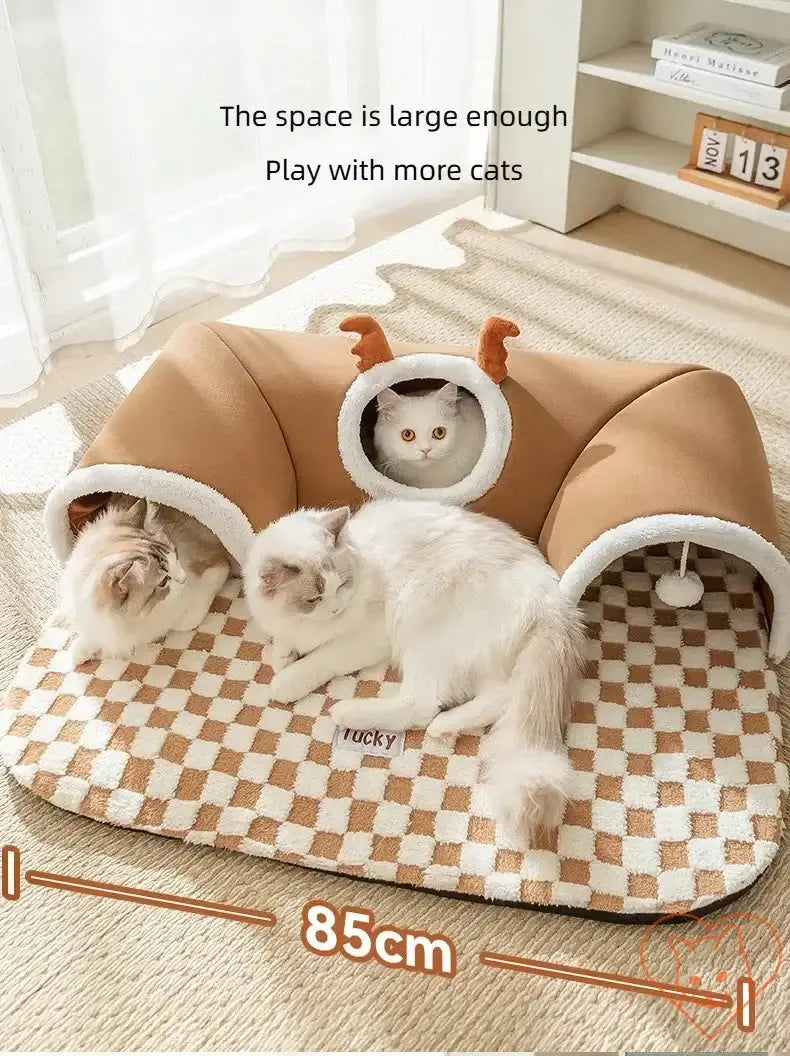 Cozy reindeer plush cat bed and tunnel with two cats, perfect for winter play and relaxation in spacious design.