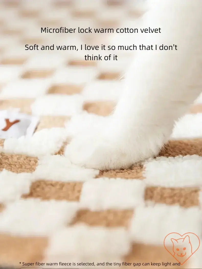 Close-up of a cat's paw on a soft, warm microfiber lock cotton velvet blanket with a stylish checkered pattern.