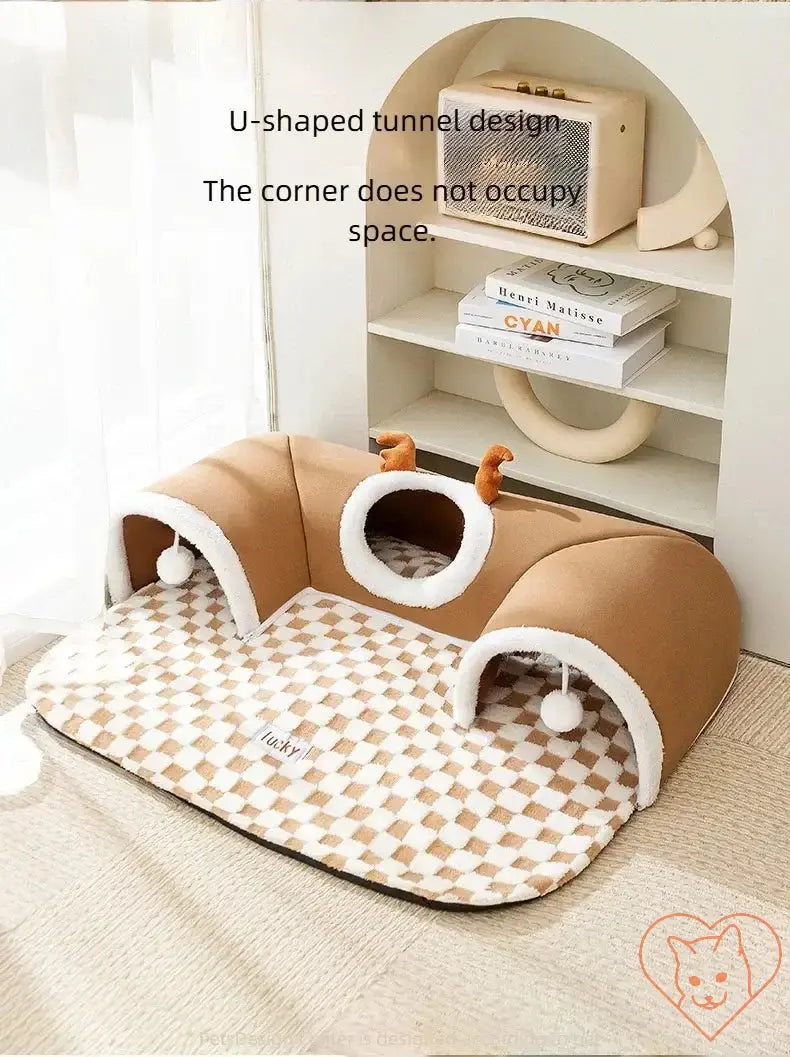 Cozy U-shaped cat bed with tunnel design, featuring playful elements and a space-saving structure. Perfect for naps and playtime.