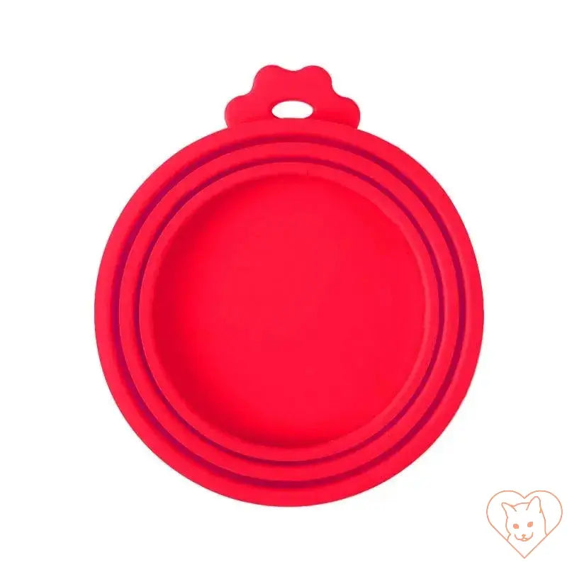 Red silicone pet food can cover designed to keep food fresh and prevent odors.