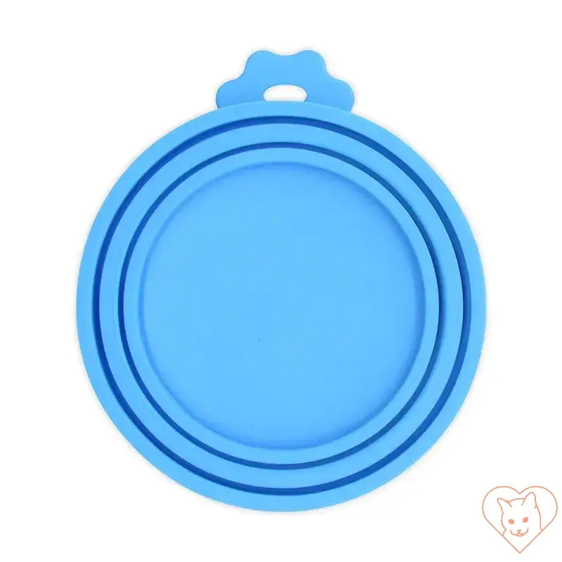 Blue silicone reusable pet food can cover for preserving freshness and preventing odors.