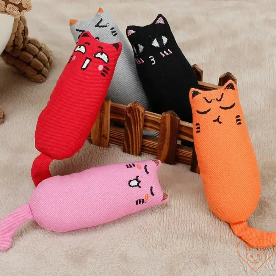 Colorful catnip plush toys shaped like cats, designed to entertain and engage feline friends.