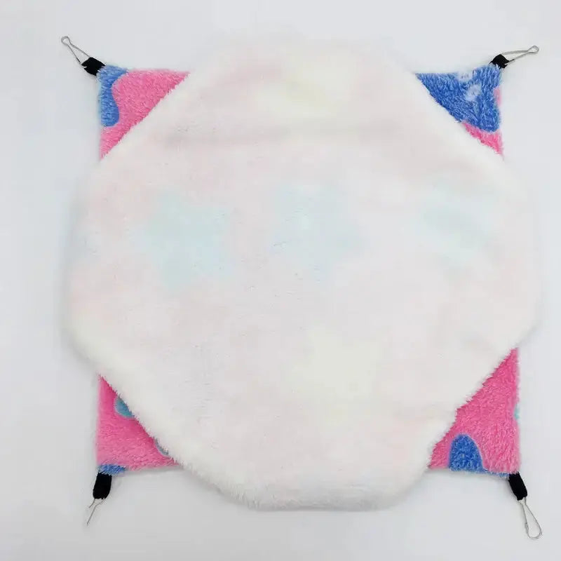 Thick Plush Hanging Tree Bed featuring soft coral and arctic fleece in pastel colors for cats and small pets.