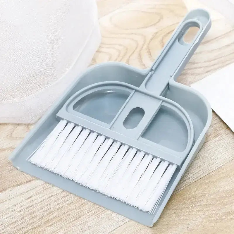 Small broom set dustpan in gray, perfect for quick clean-ups, designed for tackling everyday messes.