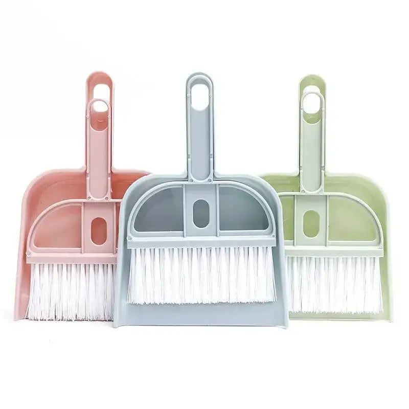 Colorful small broom set with dustpans in pastel pink, blue, and green, ideal for quick clean-ups and pet messes.