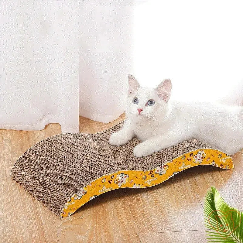 White cat lounging on a scratch-resistant corrugated cardboard scratcher sofa bed with colorful edges.