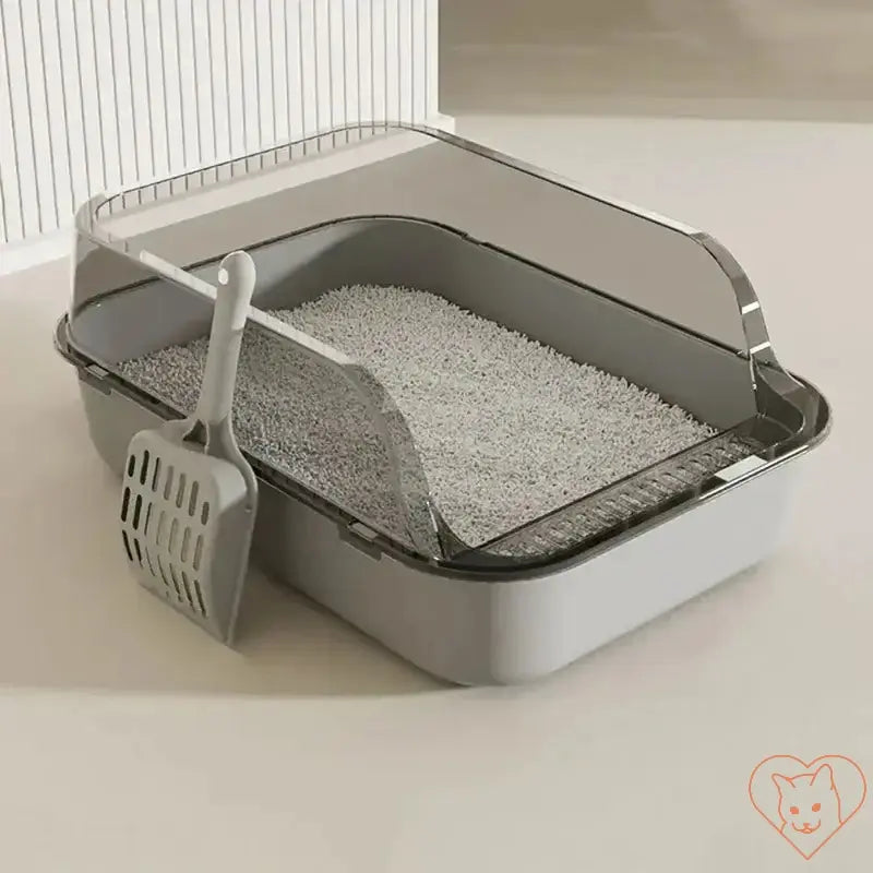 Semi-enclosed cat litter box with scoop, featuring a modern design for easy cleaning and kitten comfort.