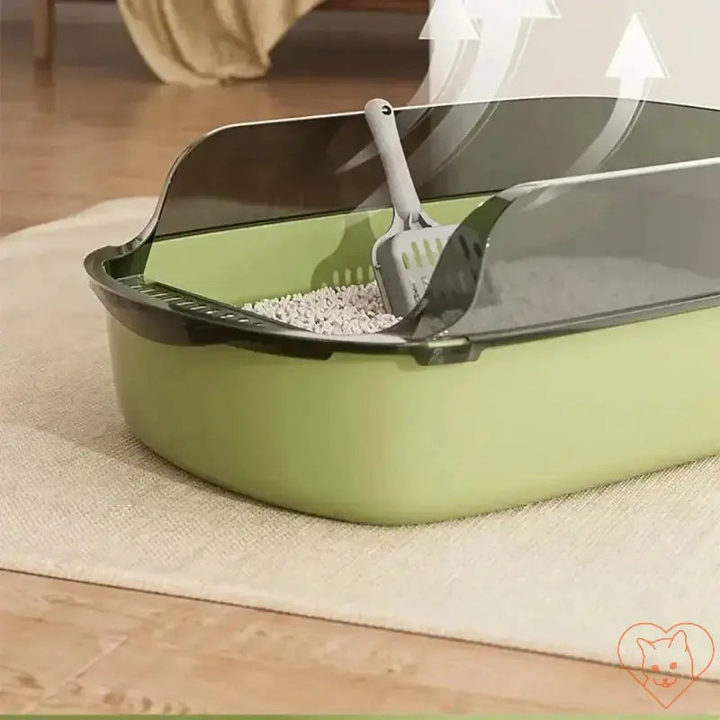 Semi-enclosed cat litter box in green with a scoop, designed for easy cleaning and minimal mess for kittens.