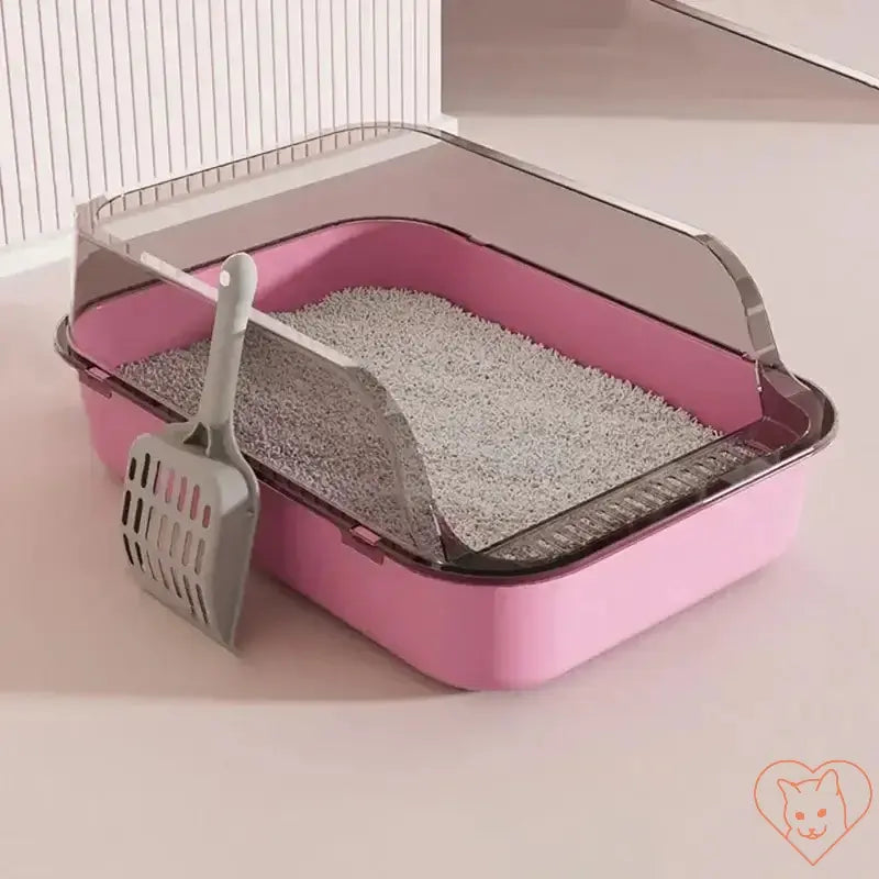 Semi-enclosed cat litter box in pink with a scoop, designed for easy cleaning and space-saving for kittens.