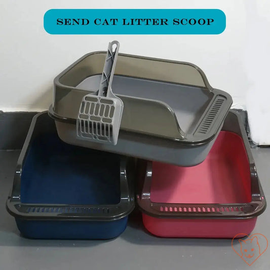 Three semi-enclosed cat litter boxes in gray, navy, and pink with a scoop for easy cleaning.