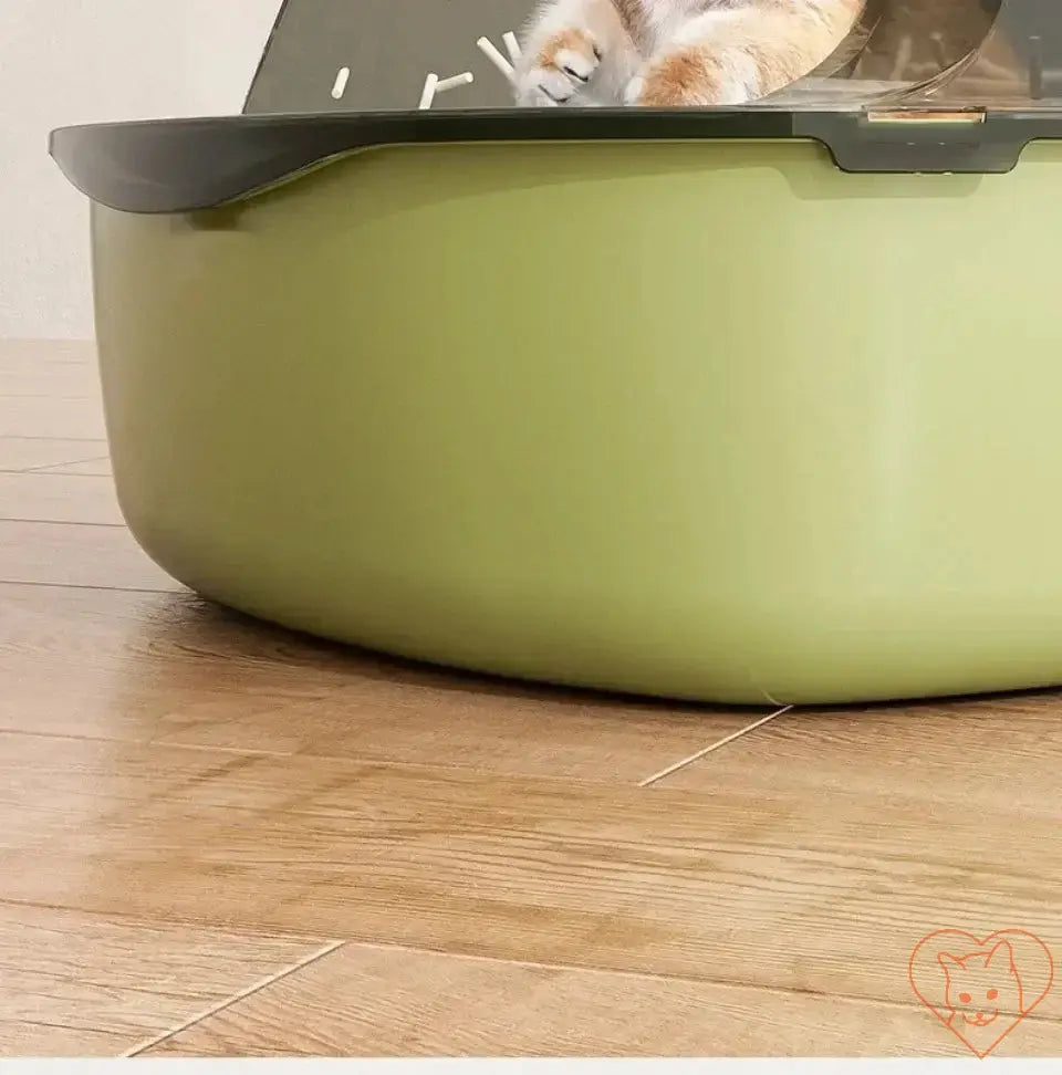 Semi-enclosed open cat litter box designed for comfort and cleanliness with high sides for odor control.