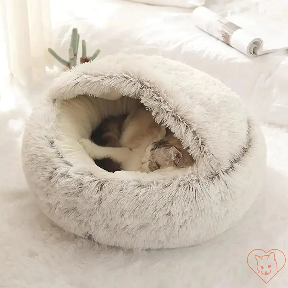 Cozy Soft Plush 2-in-1 Cat Bed with Cover featuring a sleeping cat inside.