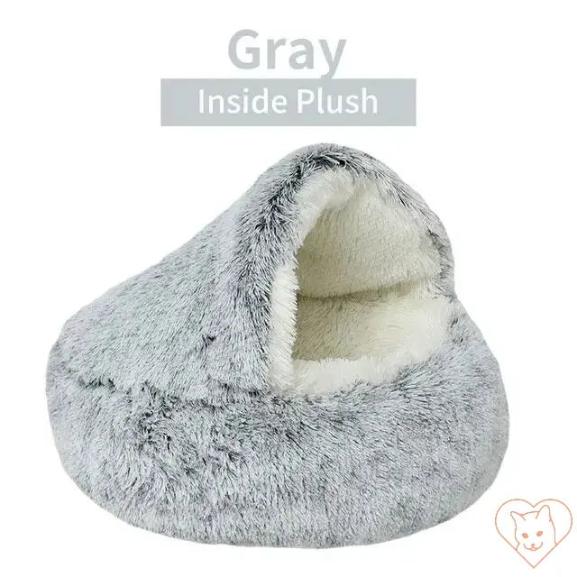 Soft plush gray cat bed with a cozy interior, perfect for small pets to relax and sleep comfortably.