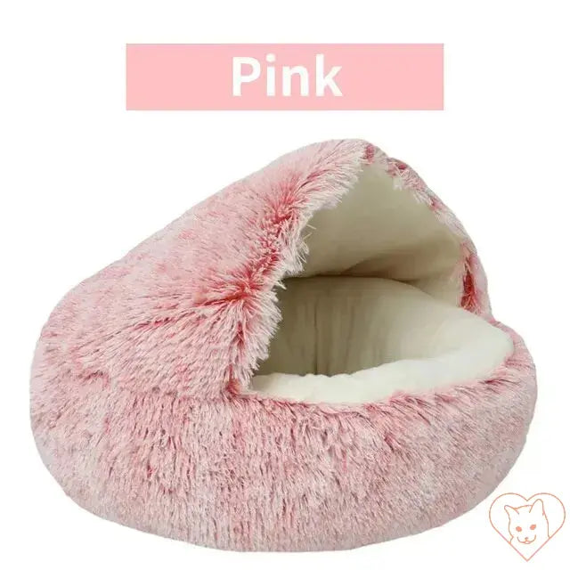 Soft plush pink 2-in-1 cat bed with cozy cover and padded interior for ultimate comfort.