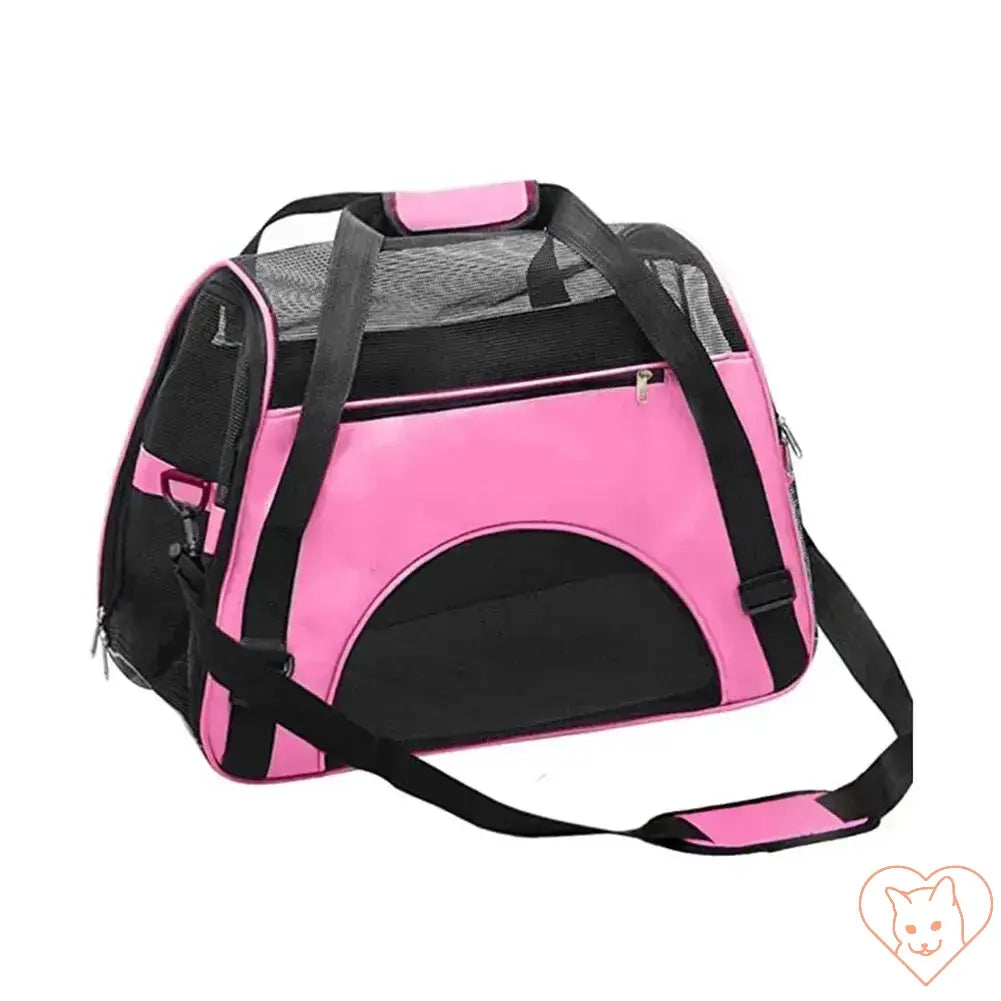 Soft-sided pink cat carrier bag with mesh panels and adjustable strap, ideal for travel with pets.