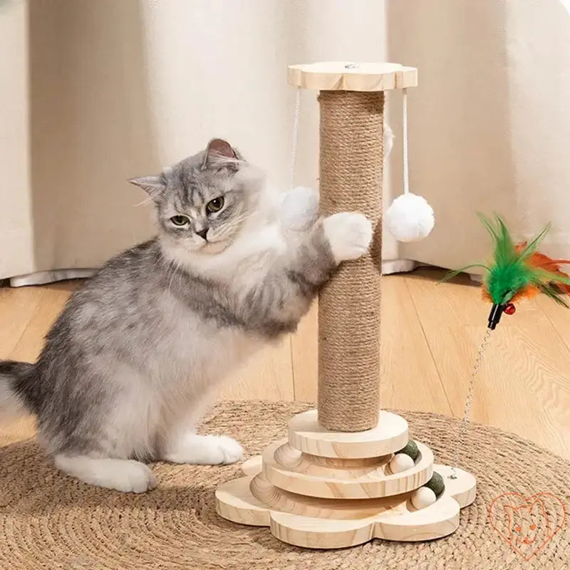 Cat enjoying the Solid Wood Turntable with Sisal Scratching Post and teaser toys, promoting activity and play.