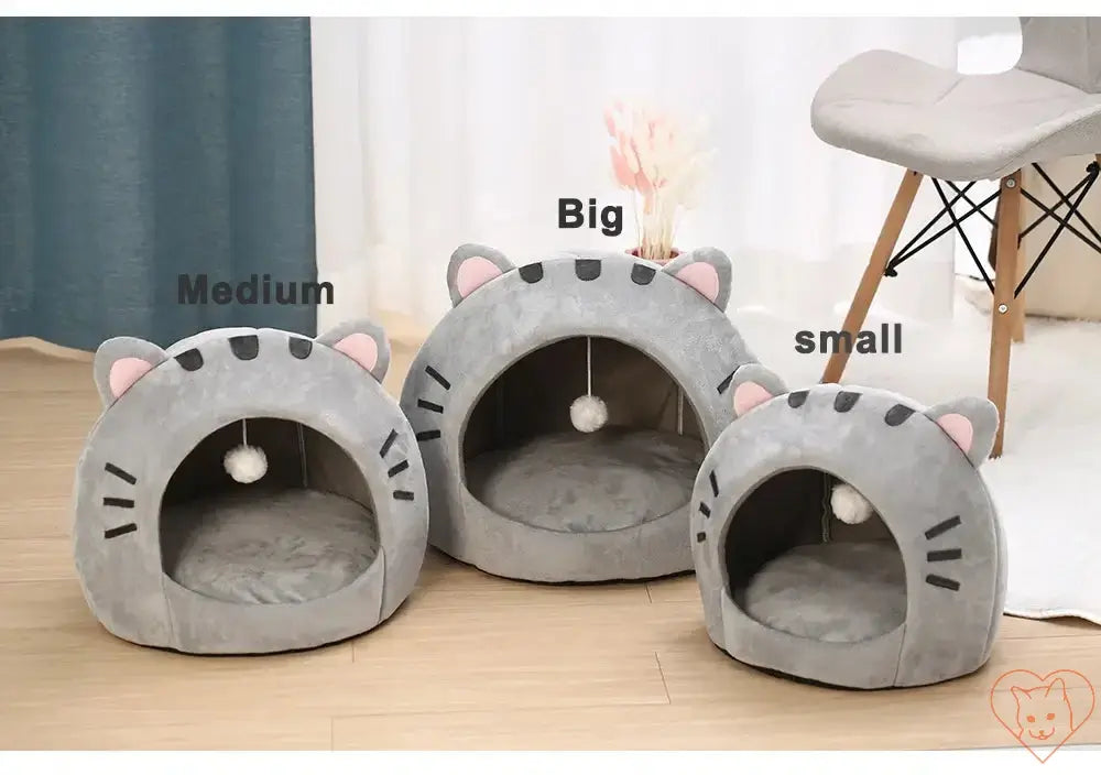 Three sizes of cozy cat beds in gray, designed for comfort and play with hanging toys.