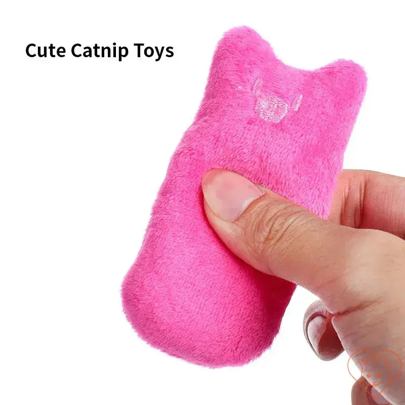 Interactive plush catnip chew toy for dental health, pink cat design, ideal for keeping cats entertained.