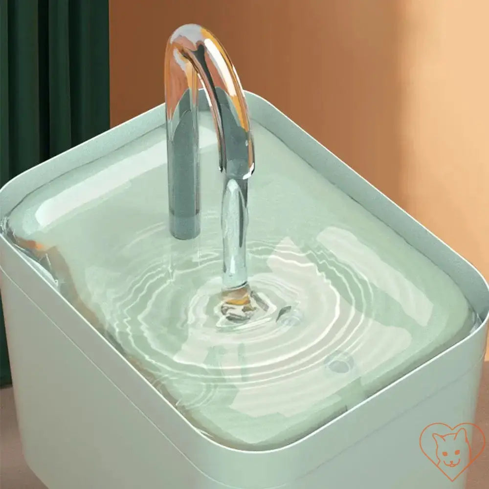 Close-up of Ultra-Quiet 1.5L Cat Water Fountain with flowing water and sleek design.