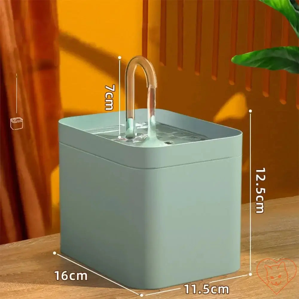 Ultra-Quiet 1.5L cat water fountain with clear water stream and sleek design, perfect for keeping pets hydrated.