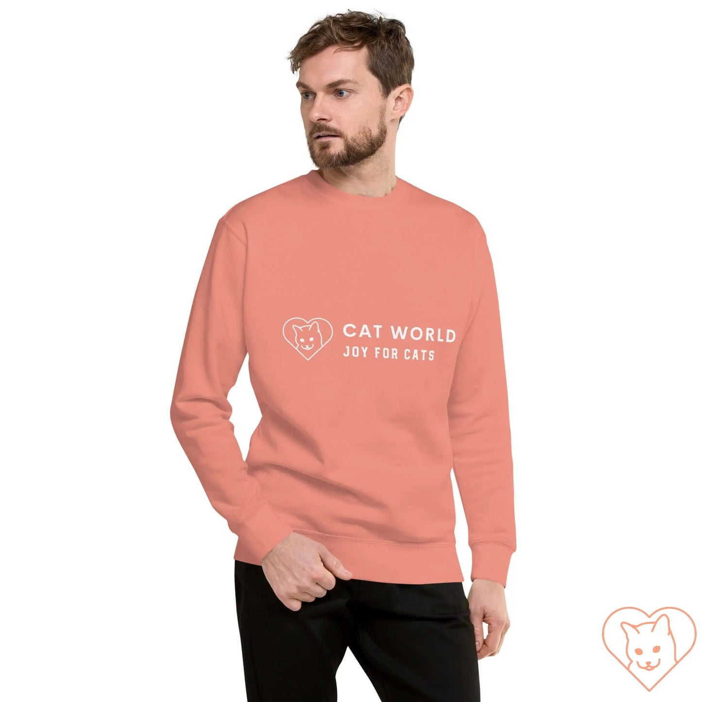 Unisex coral sweatshirt featuring "Cat World Joy for Cats" graphic on the front, styled for a contemporary look.