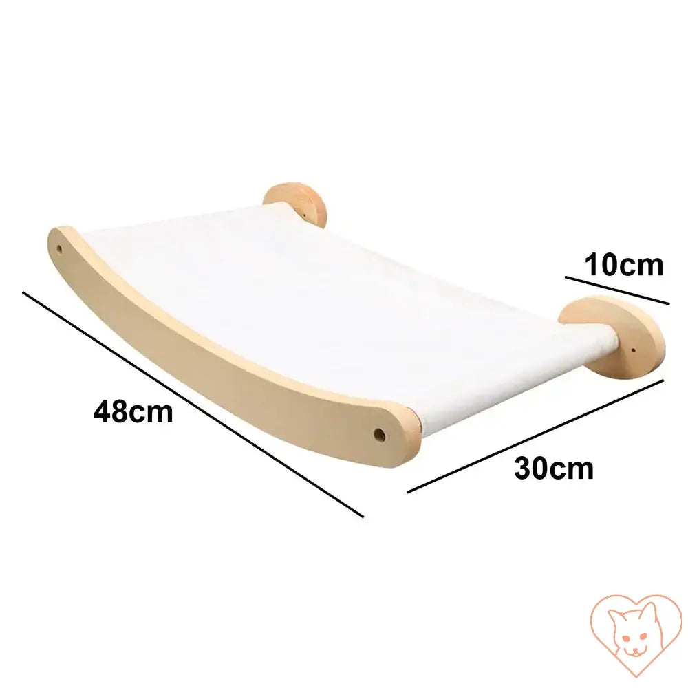 Wall-mounted cat hammock with natural wood frame and soft white fabric, dimensions: 48cm x 30cm x 10cm.