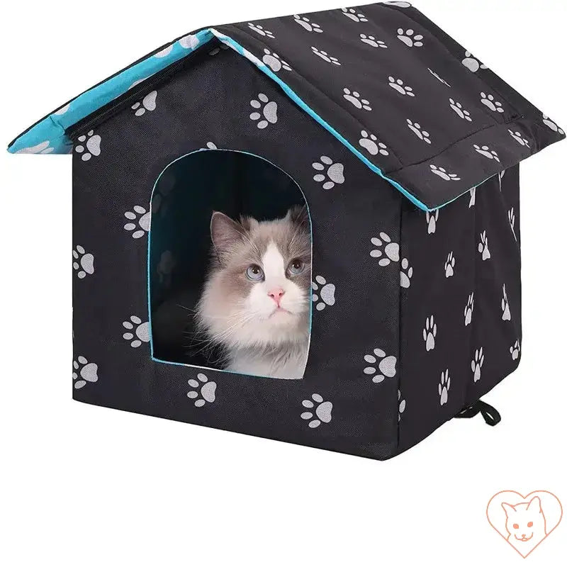 Waterproof outdoor cat house with paw prints, featuring a cozy interior and a cat peeking out.